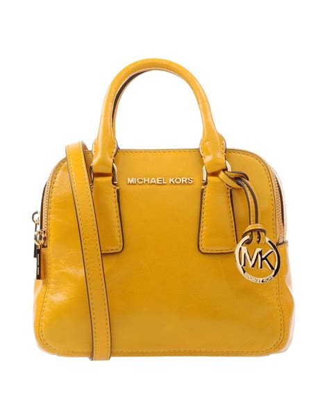 michael kors yellobags|michael kors yellow handbags.